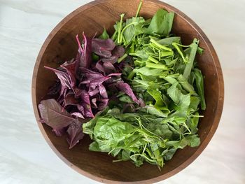 High angle view of chopped vegetables in bowl on table