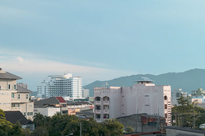 Exterior of buildings in city against sky