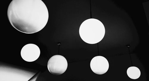 Low angle view of illuminated lights