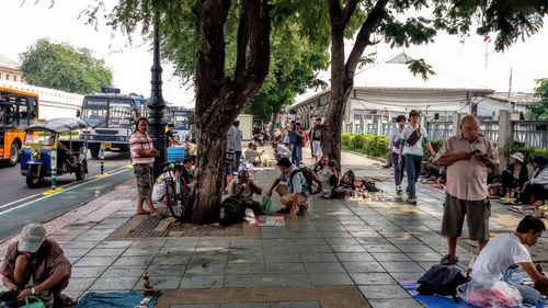 People at town square against sky