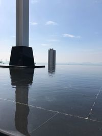 Reflection of built structures in calm water