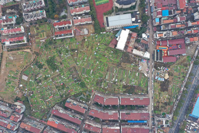 High angle view of street amidst buildings in town