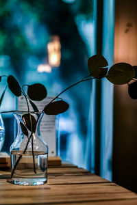 Close-up of illuminated glass on table