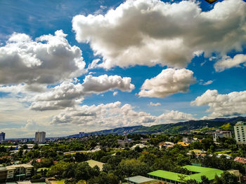 Aerial view of townscape against sky