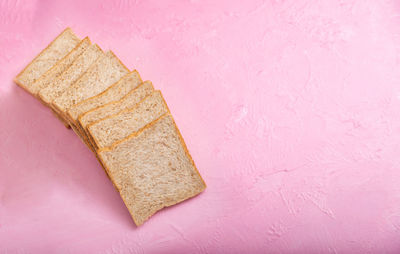 High angle view of bread on table against wall