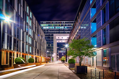 Illuminated buildings in city at night