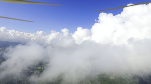 Scenic view of landscape against blue sky
