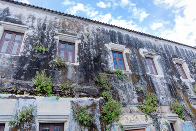 Low angle view of old building against sky