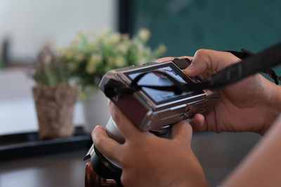 Close-up of woman using mobile phone