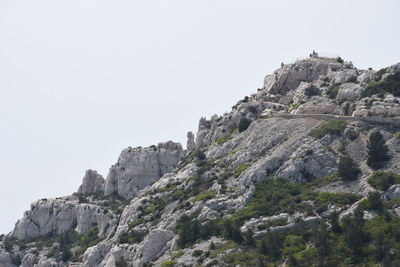 Low angle view of rock formation against clear sky