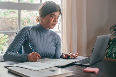 Businesswoman working at office