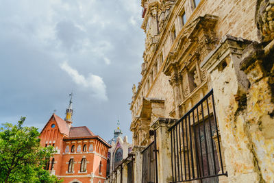 Low angle view of old building against sky