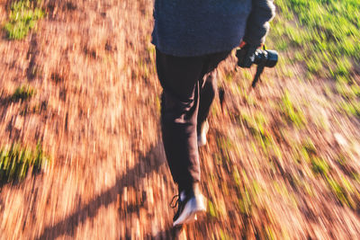 Low section of man walking outdoors