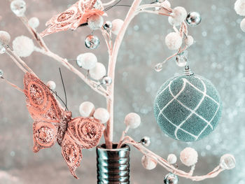 Close-up of christmas decoration hanging on branch