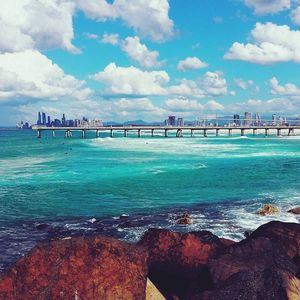 Scenic view of sea against cloudy sky