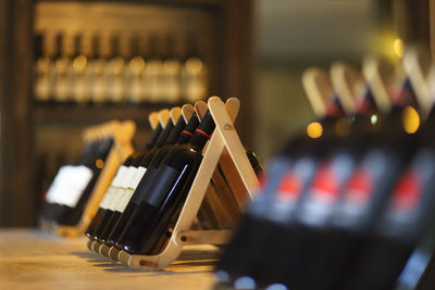 Close-up of wine bottles on table