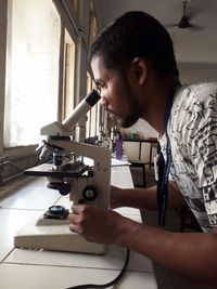 High angle view of man working at workshop