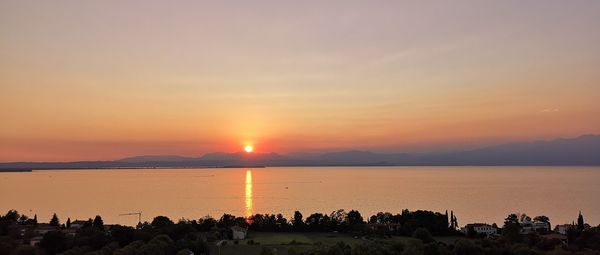 Panoramic view of lake during sunset