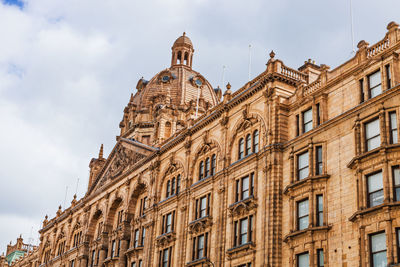 Iconic harrods department store in london with historic architecture. london, uk, 7 april 2024