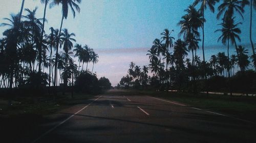 Empty road at sunset