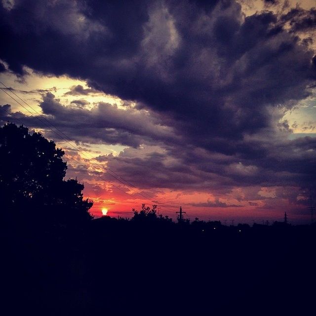 silhouette, sunset, sky, scenics, tranquil scene, tranquility, beauty in nature, cloud - sky, landscape, nature, cloudy, dramatic sky, tree, idyllic, orange color, cloud, weather, dark, atmospheric mood, overcast