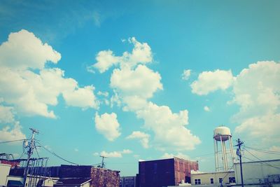 Low angle view of building against blue sky