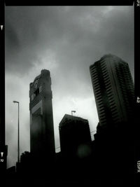 Low angle view of modern buildings against sky