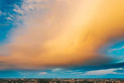 Low angle view of dramatic sky during sunset