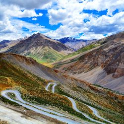 Country road leading towards mountains