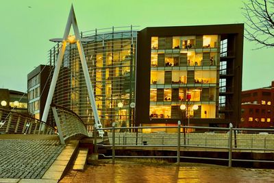 Buildings in city at dusk