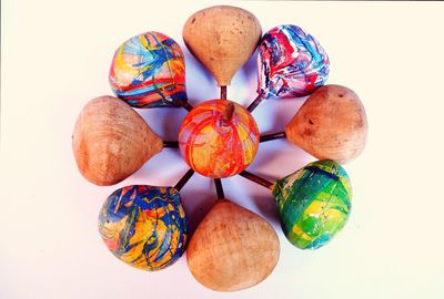 Close-up of multi colored eggs on table