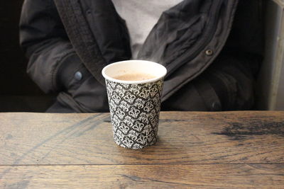 Close-up of coffee cup on table