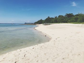 Scenic view of beach against clear sky