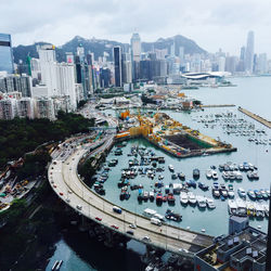 High angle view of city and buildings against sky