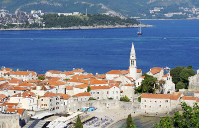 High angle view of town by sea