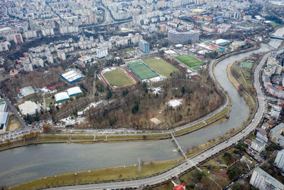 Aerial above view of river crossing the city. drone shot of cluj napoca, romania