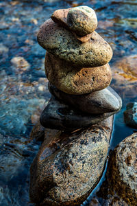 Close-up of stone stack on rock