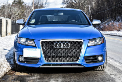 Close-up of blue car in winter