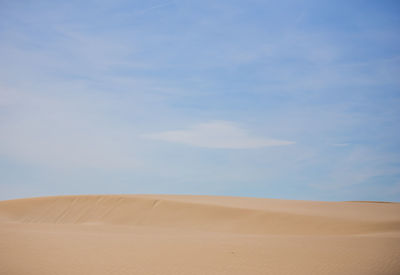 Scenic view of desert against sky