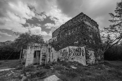 Abandoned building against sky