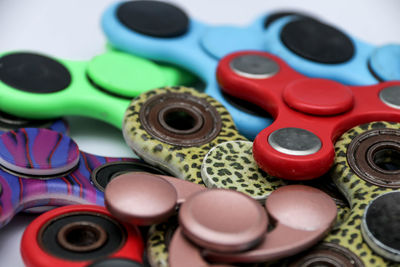 Close-up of fidget spinners on white background