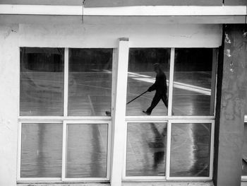 Woman seen through window