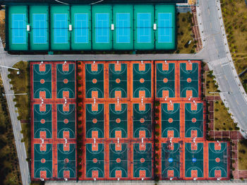 Aerial view of empty sport courts by streets