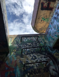 Low angle view of graffiti on old building