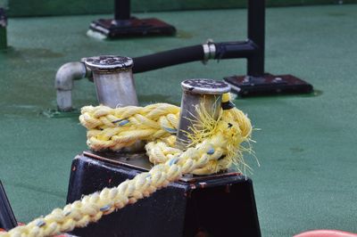 Close-up of rope tied on metal