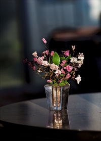 Close-up of pink flowers in vase on table