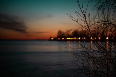 Scenic view of sea against orange sky