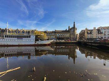 Reflection of buildings in river