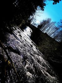 Low angle view of waterfall