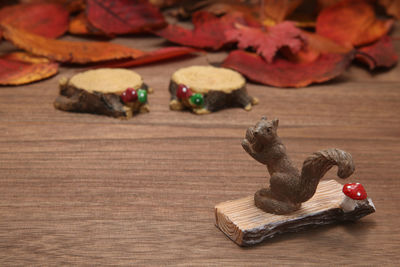 Close-up of squirrel figurine on table